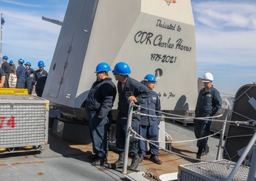 Sailors aboard the USS Howard conduct an ammo offload in Yokosuka, Japan