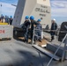 Sailors aboard the USS Howard conduct an ammo offload in Yokosuka, Japan