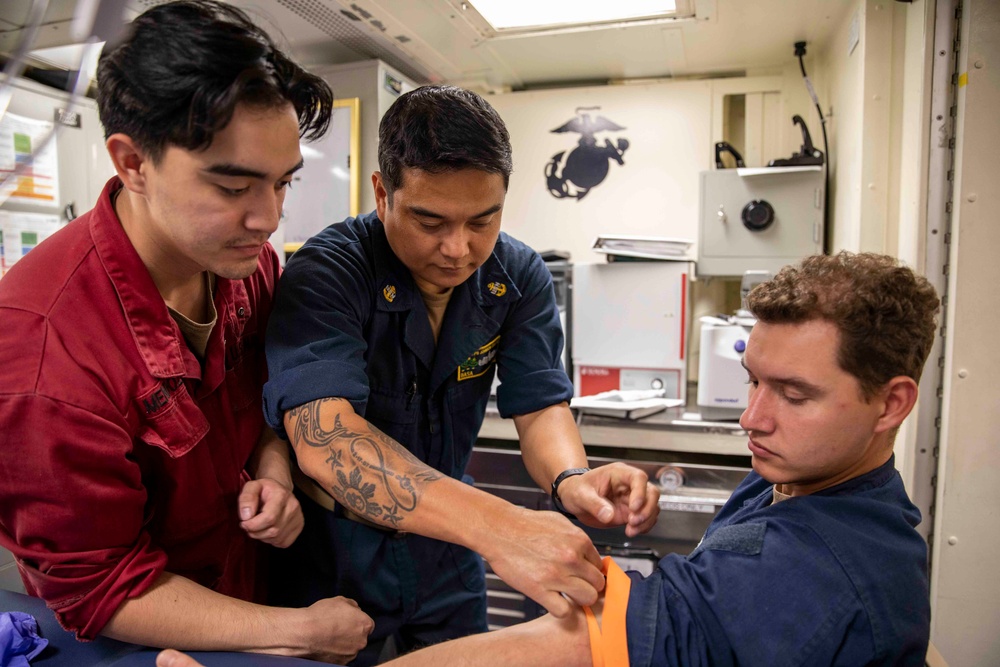 USS Ralph Johnson Conducts Stretcher Bearer Training