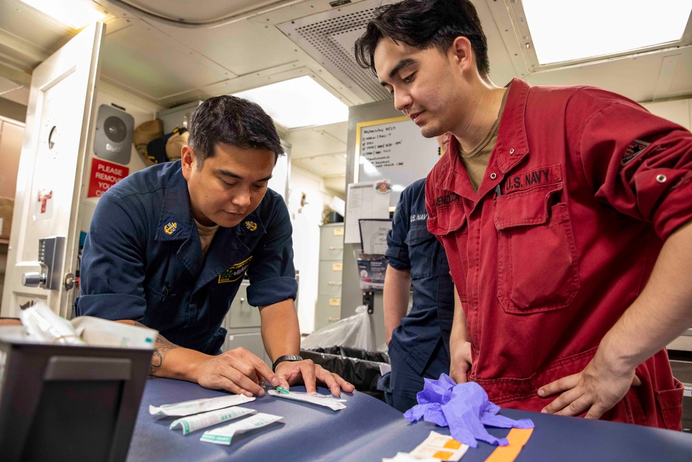 USS Ralph Johnson Conducts Stretcher Bearer Training