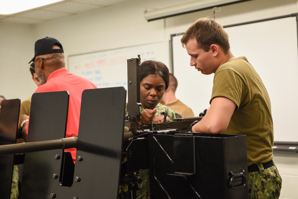 SCSTC GL Gunner's Mate Students Practice Operation and Maintenance of .50 cal Machine Gun