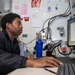 USS George Washington Sailors manage transactions