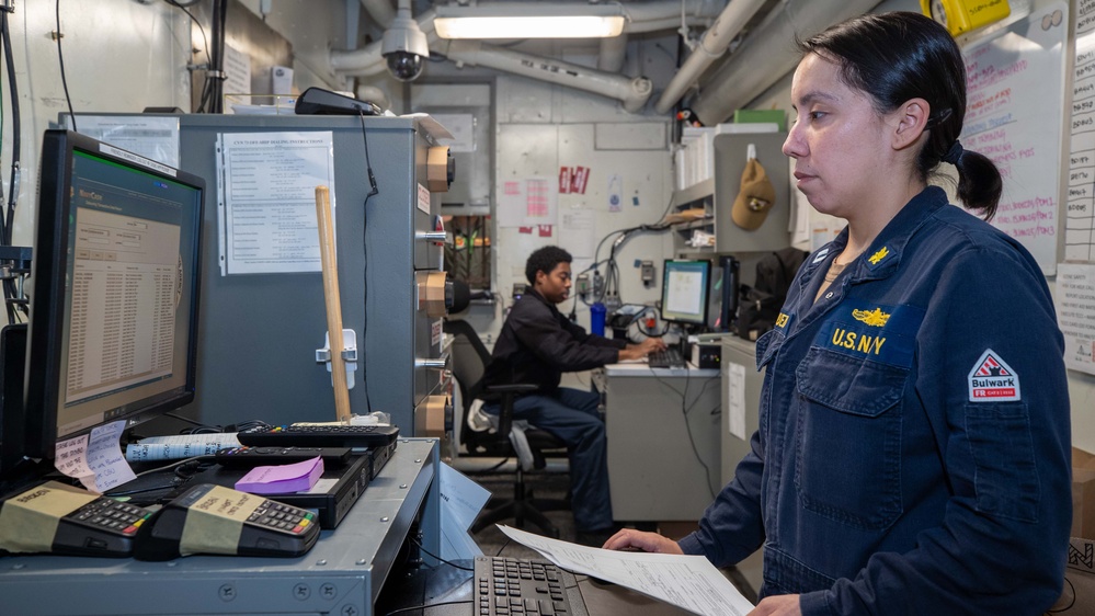 USS George Washington Sailors manage transactions