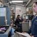 USS George Washington Sailors manage transactions