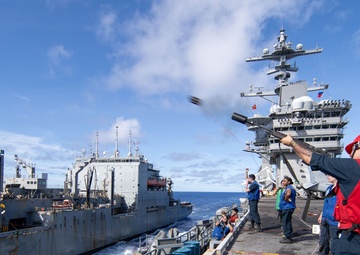 USS George Washington conducts replenishment-at-sea with USNS Cesar Chavez
