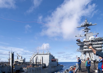 USS George Washington conducts replenishment-at-sea with USNS Cesar Chavez