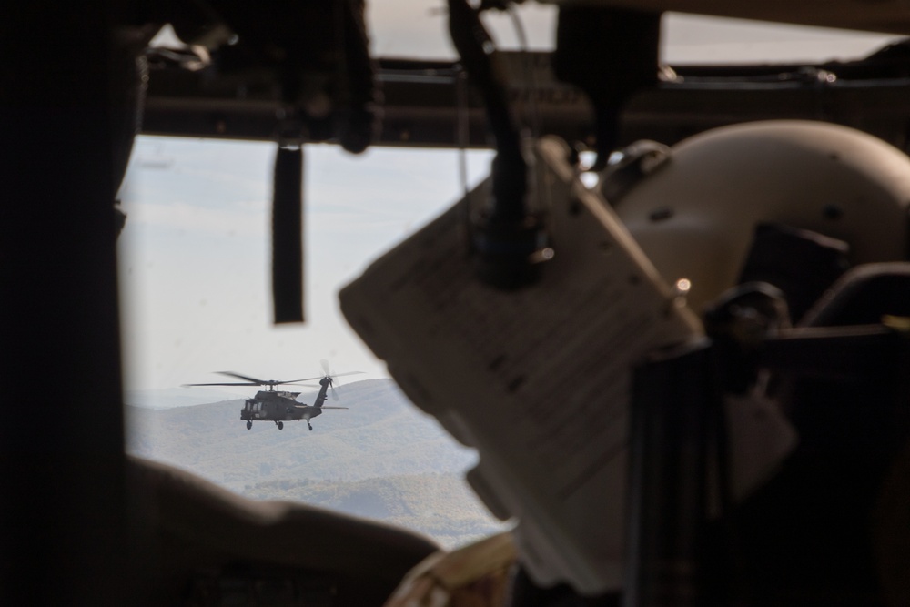 Army National Guard Soldiers provide aerial support for British training exercise