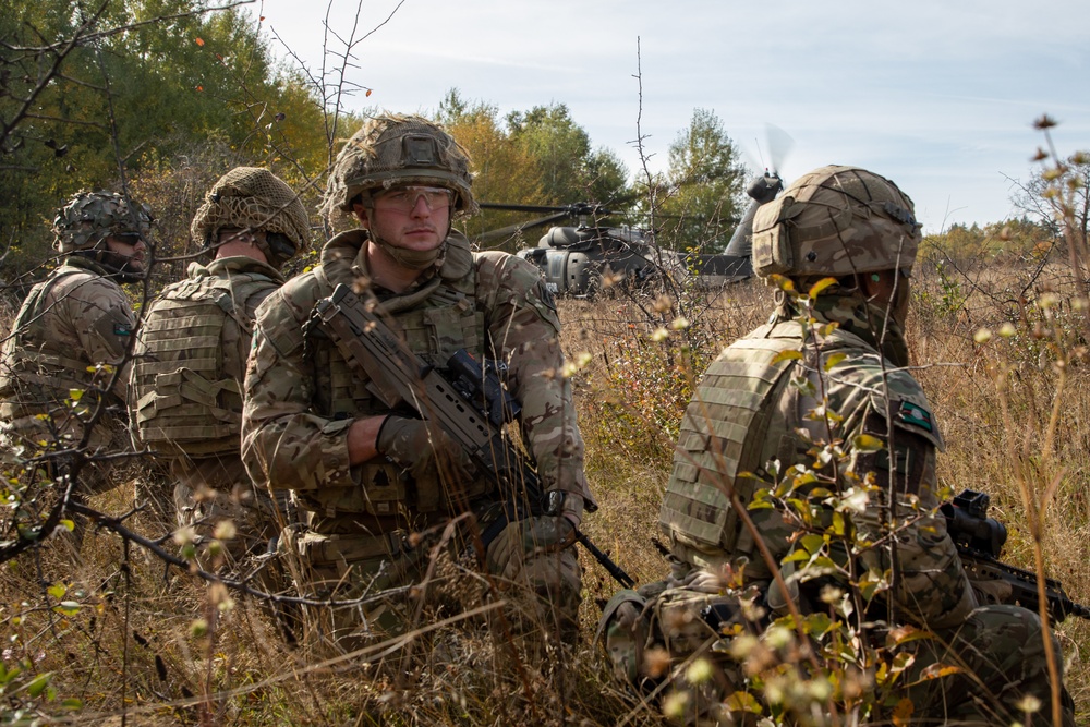 Army National Guard Soldiers provide aerial support for British training exercise