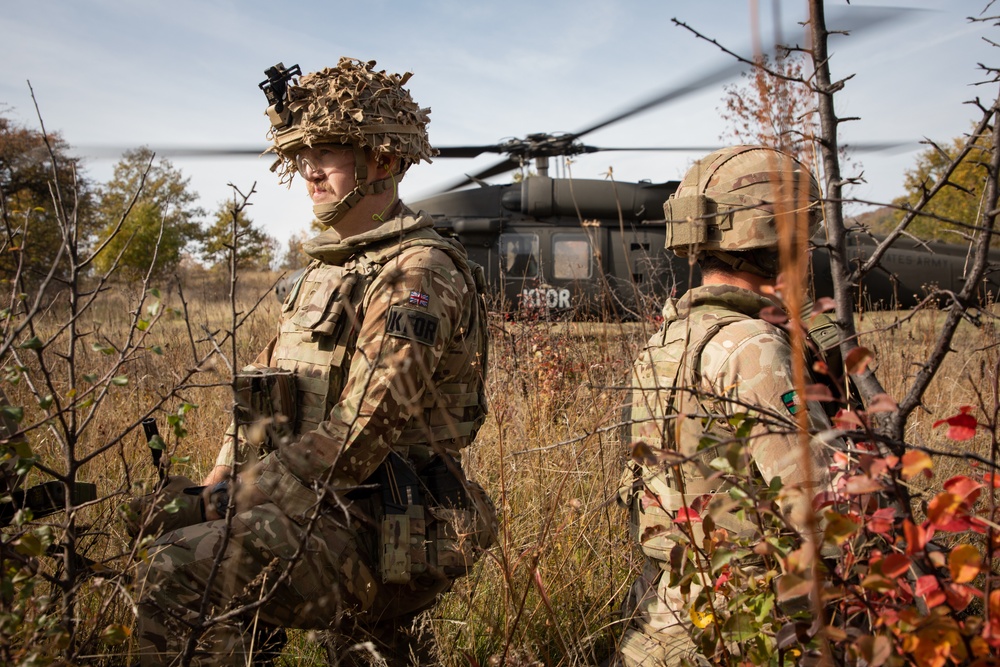 Army National Guard Soldiers provide aerial support for British training exercise