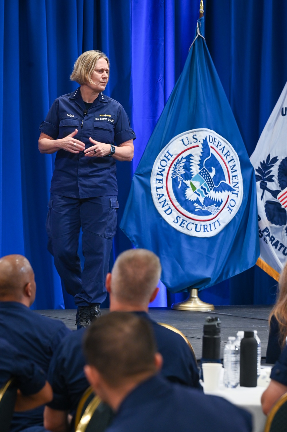 Commandant and Master Chief Petty Officer of the Coast Guard discuss service culture with crews in the greater Miami area