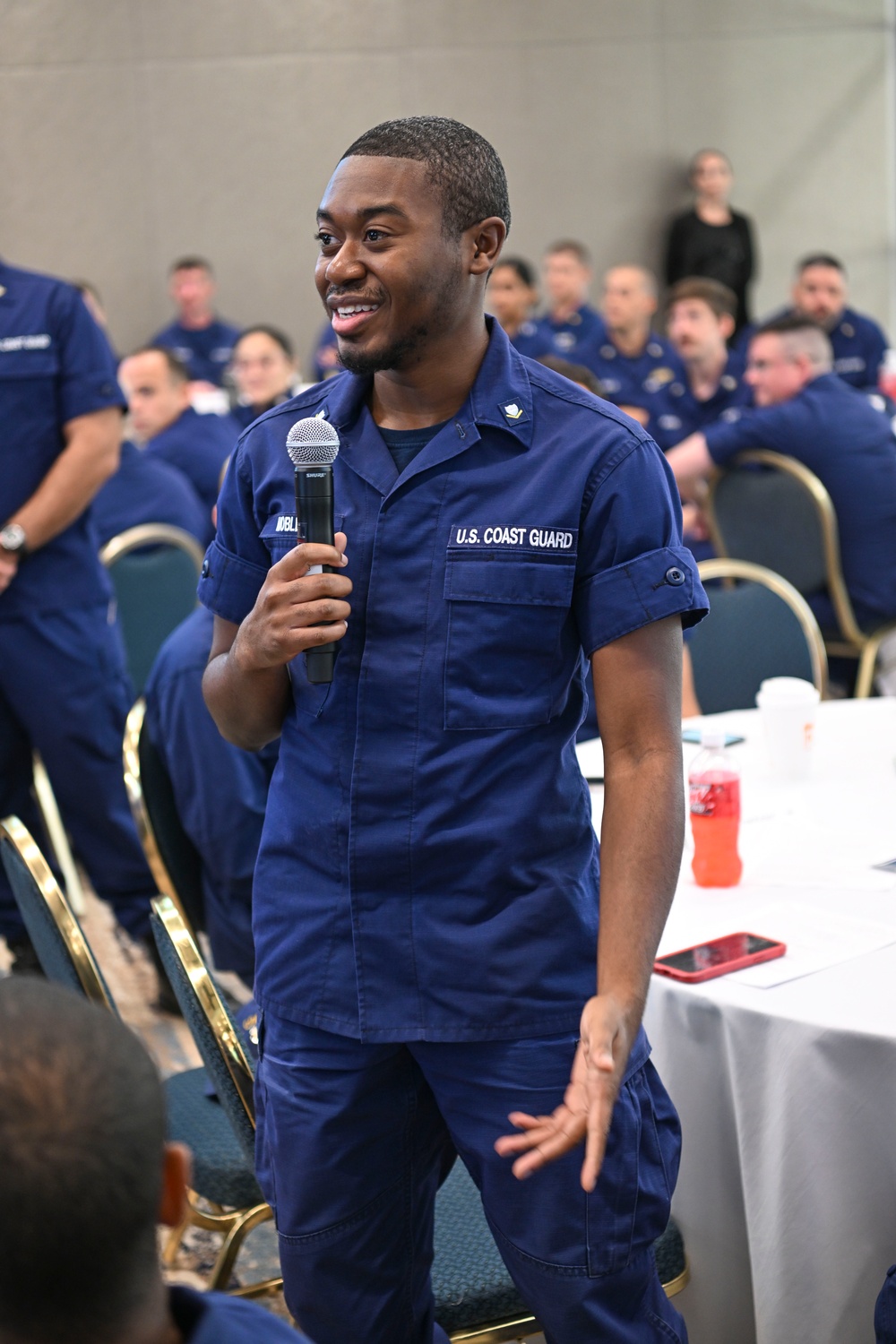 Commandant and Master Chief Petty Officer of the Coast Guard discuss service culture with crews in the greater Miami area