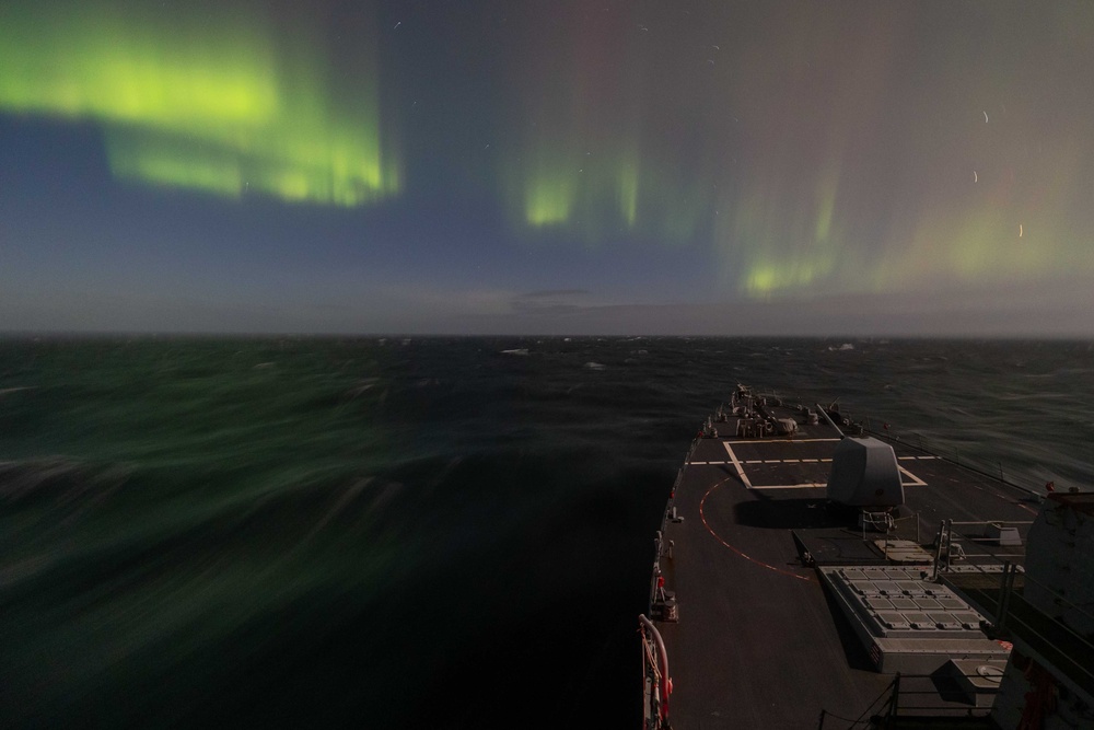 USS Stout Sails Under Northern Lights