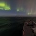 USS Stout Sails Under Northern Lights