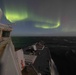 USS Stout Sails Under Northern Lights