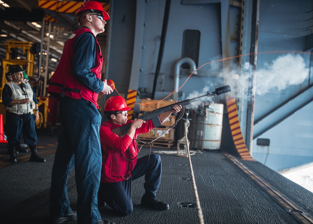 USS George Washington conducts replenishment-at-sea with USNS Cesar Chavez