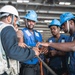 USS George Washington conducts replenishment-at-sea with USNS Cesar Chavez