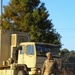 Sustainment Soldiers Conduct preventative maintenance check on M1087 Expandable Van Shelter