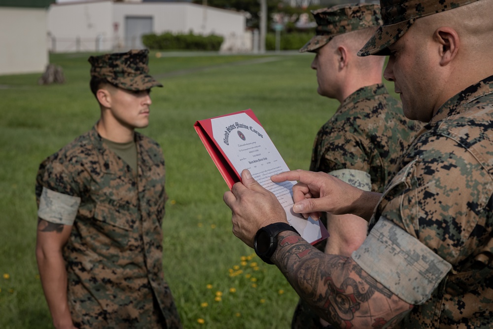 12th MLR Marine Enters the Staff Noncommissioned Officer Ranks and Reenlists