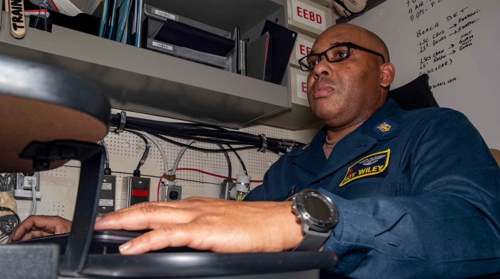USS George Washington Sailors Review Travel Claims and Qualifications