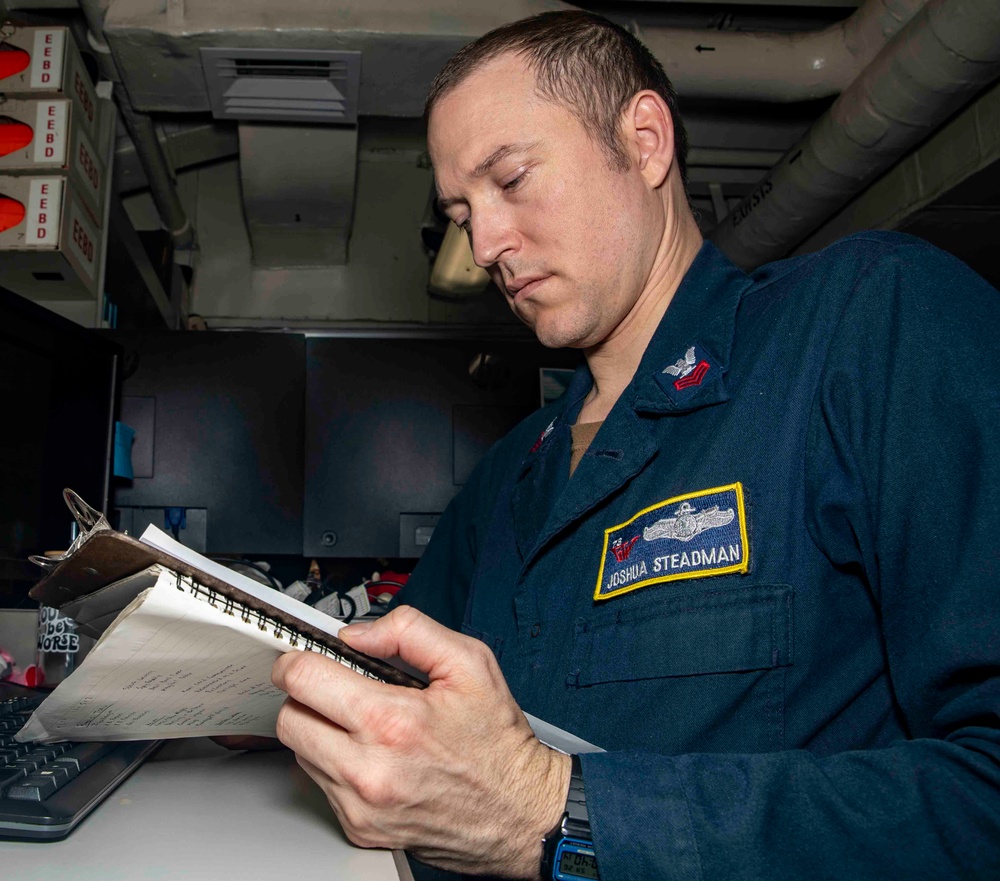USS George Washington Sailors Review Travel Claims and Qualifications