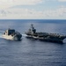 George Washington conducts replenishment-at-sea with USNS Cesar Chavez