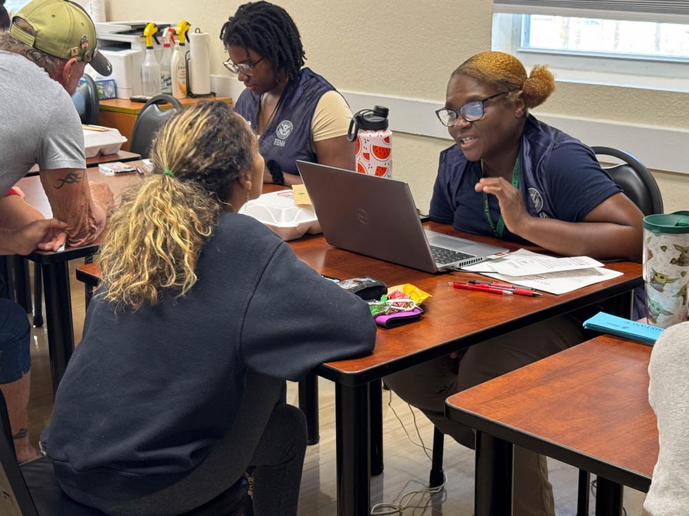 FEMA Disaster Survivor Assistance Team Members Help Residents