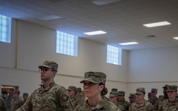 Florida Army National Guard Soldiers gather with loved ones for a farewell ceremony before departing for the Southwest Border.