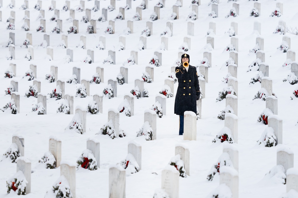 U.S. Army Band Bugler Sounds &quot;Taps&quot; Amid Snowstorm at Arlington