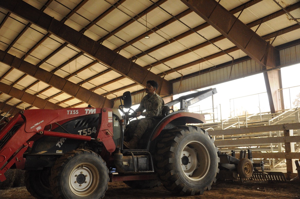 Soldiers Assist in Warehouse Operations