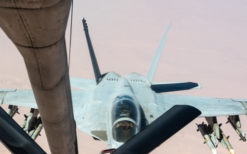 KC-135 refuels U.S. Navy Fighters in U.S. Central Command