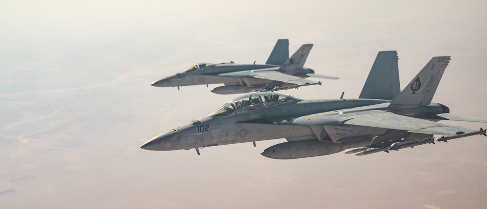 KC-135 refuels U.S. Navy Fighters in U.S. Central Command