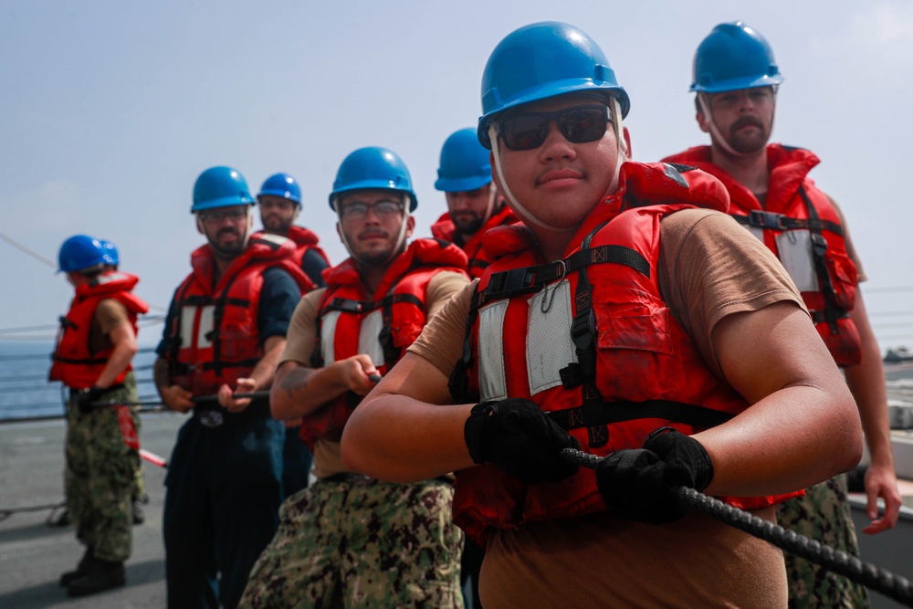 Michael Murphy conducts a replenishment-at-sea