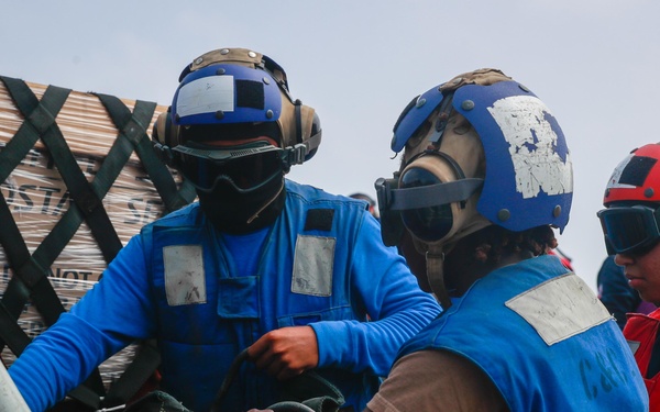 Michael Murphy conducts a replenishment-at-sea