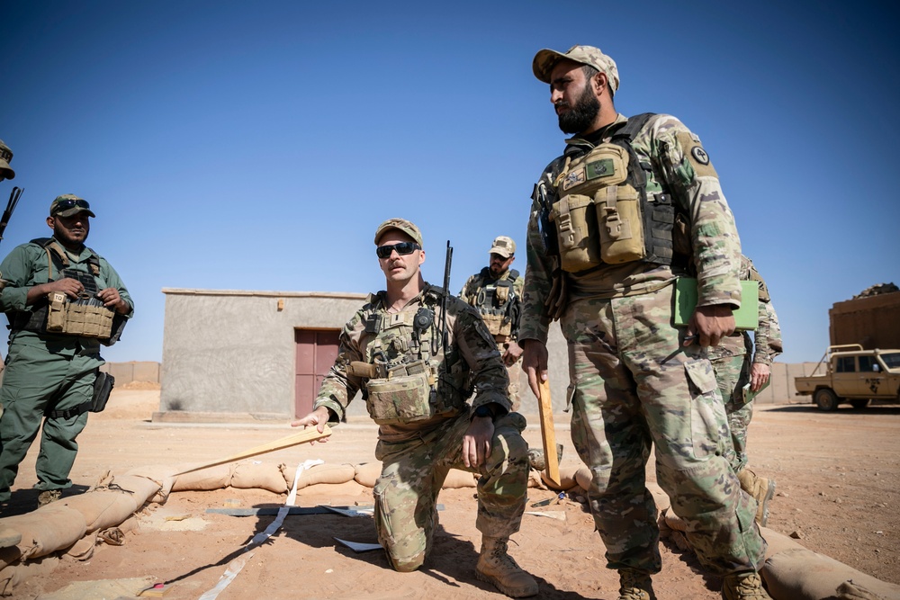 Coalition forces conduct a live-fire exercise with partners