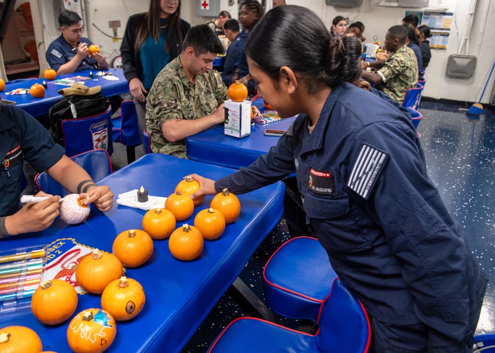 USS Essex Decorates Pumpkins at a MWR Event