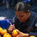 USS Essex Decorates Pumpkins at a MWR Event