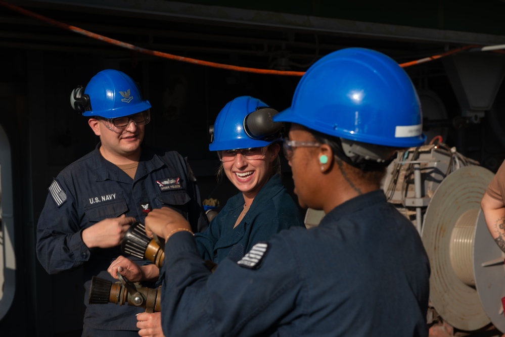 USS John C. Stennis Sailors conduct Routine Maintenance Check on Hoses