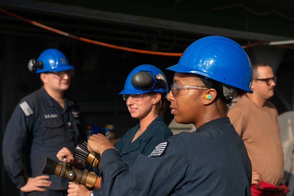 USS John C. Stennis Sailors conduct Routine Maintenance Check on Hoses