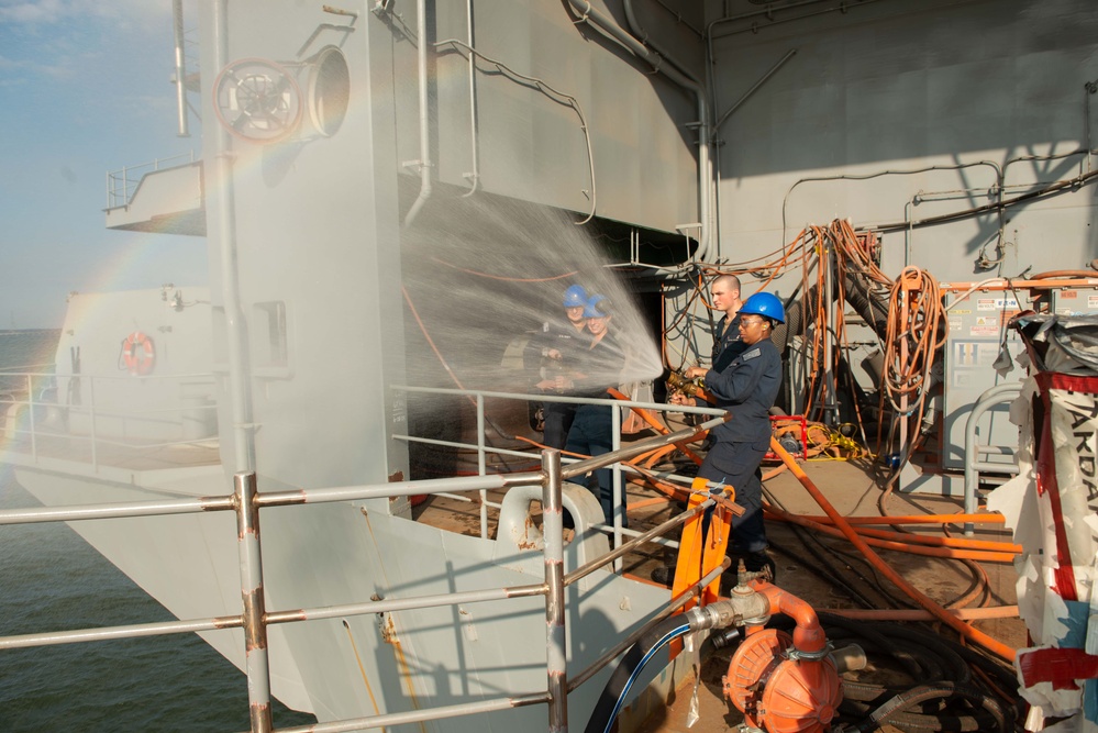 USS John C. Stennis Sailors conduct Routine Maintenance Check on Hoses