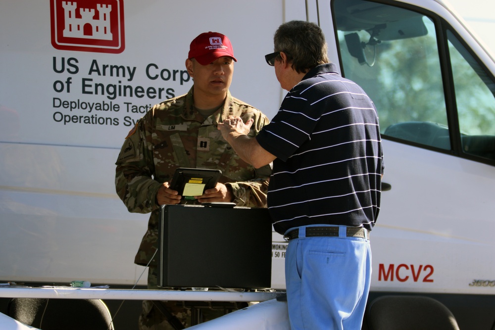 CPT. John Lim assists homeowner with blue roof application