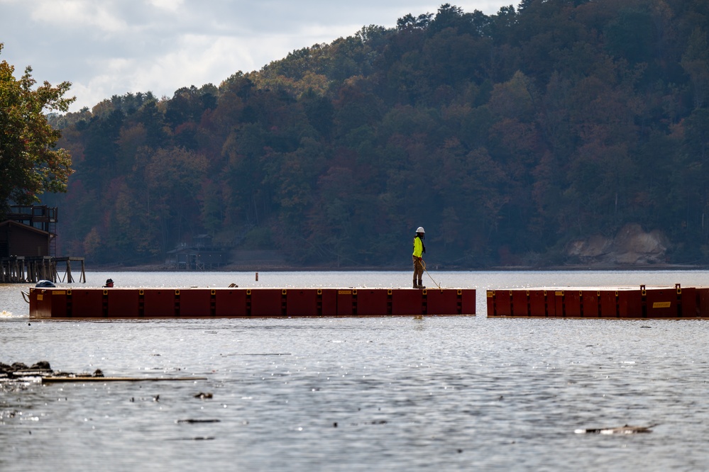 Crews construct floating platform for Lake Lure debris removal