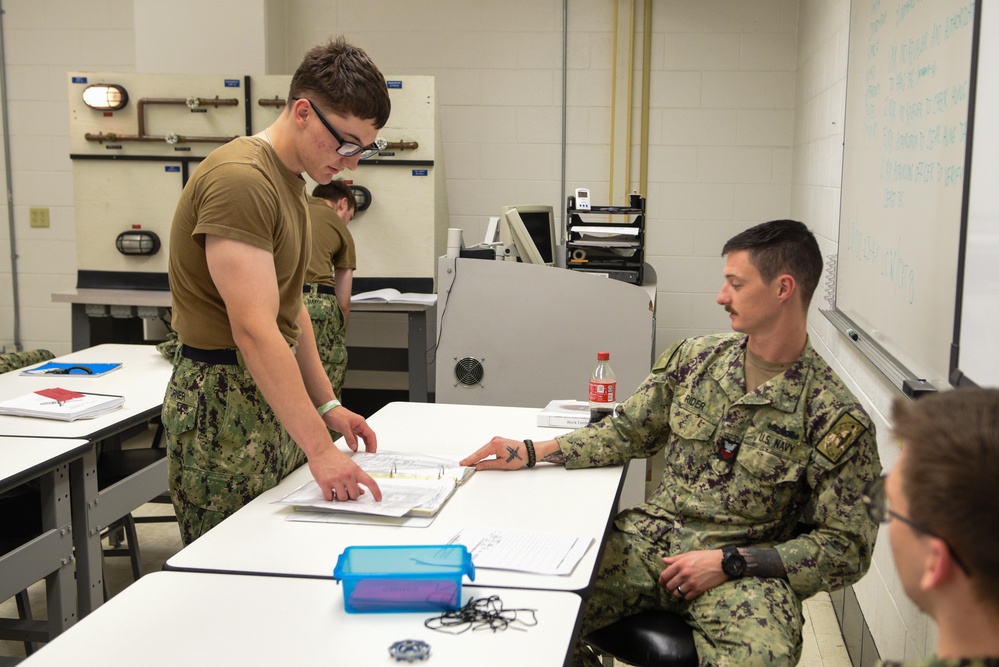 SCSTC Accession-Level Sailors Practice Hanging Danger Tags