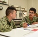 SCSTC Accession-Level Sailors Practice Hanging Danger Tags