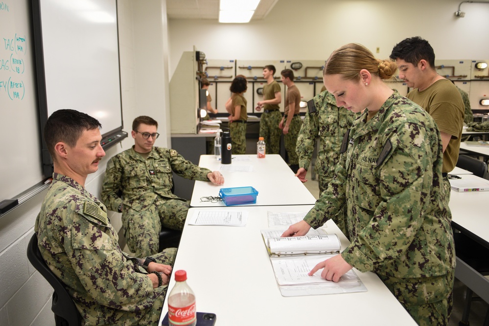 SCSTC Accession-Level Sailors Practice Hanging Danger Tags
