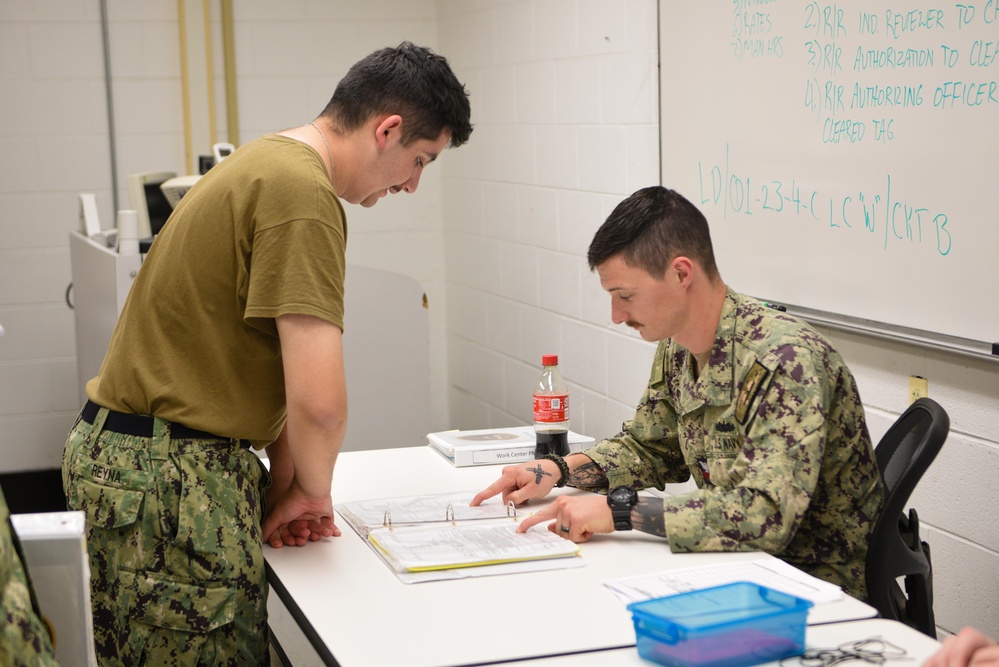 SCSTC Accession-Level Sailors Practice Hanging Danger Tags