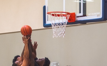 USS Ronald Reagan (CVN 76) Sailors participate in a basketball game hosted by MWR