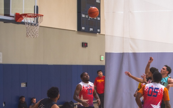 USS Ronald Reagan (CVN 76) Sailors participate in a basketball game hosted by MWR