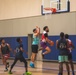 USS Ronald Reagan (CVN 76) Sailors participate in a basketball game hosted by MWR