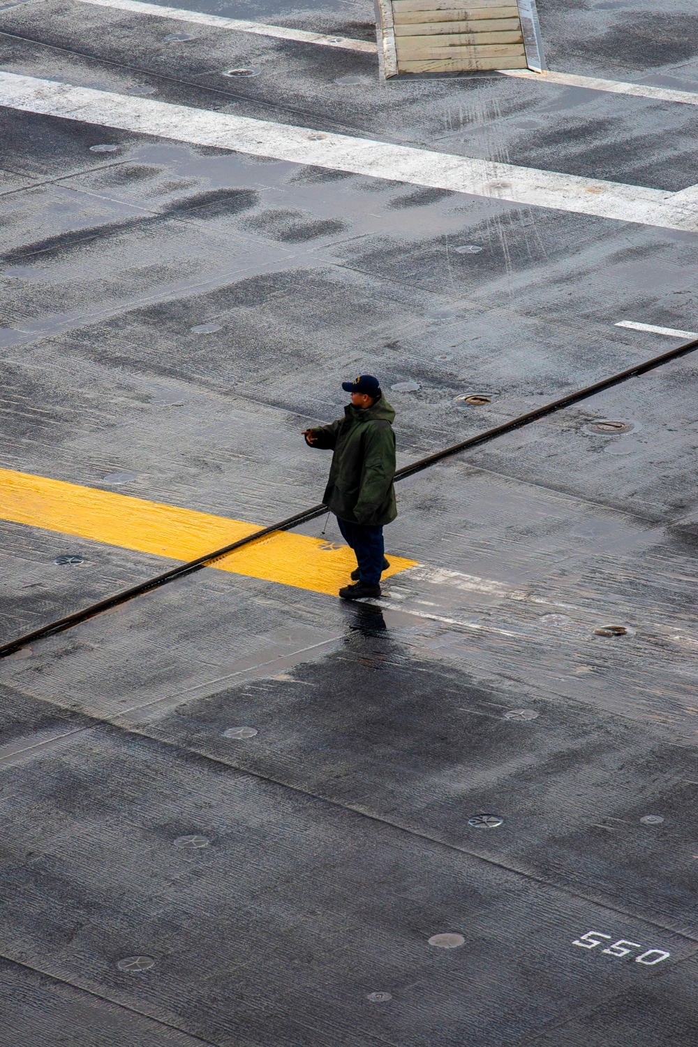 Nimitz Sailors Perform Maintenance on Arresting Cables