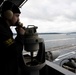 Nimitz Sailor Uses Sound Powered Telephone